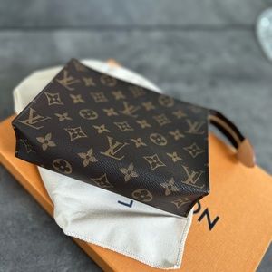 Louis Vuitton  Monogram travel toilette pouch